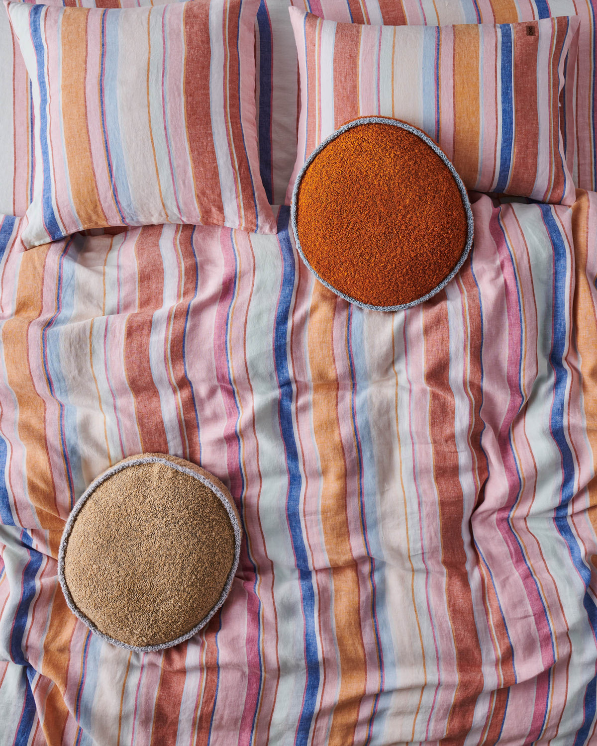 Kip & Co MARMALADE SKY ROUND BOUCLE CUSHION | The Ivy Plant Studio | KIP & CO CUSHIONS  Edit alt text