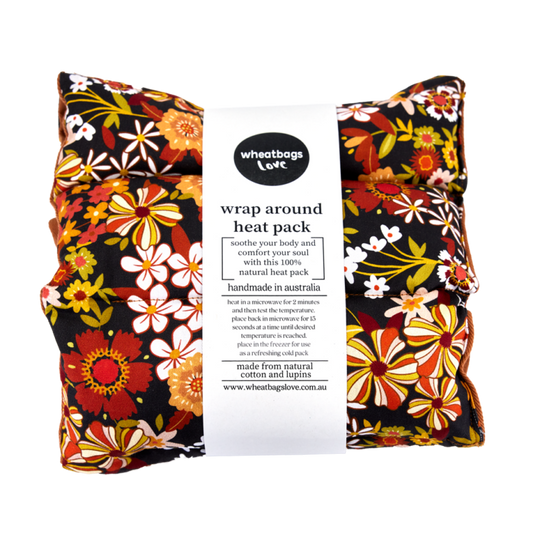 Wheatbags Love WRAP AROUND HEAT PACK - GROOVY FLOWERS BLACK | THE IVY PLANT STUDIO